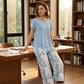 💥Free delivery on single items!👗 Women’s two-piece set—a layered, asymmetrical long-line top and printed wide-leg trousers, breathable and comfortable✨