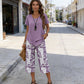 💥Free delivery on single items!👗 Women’s two-piece set—a layered, asymmetrical long-line top and printed wide-leg trousers, breathable and comfortable✨