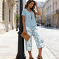 💥Free delivery on single items!👗 Women’s two-piece set—a layered, asymmetrical long-line top and printed wide-leg trousers, breathable and comfortable✨